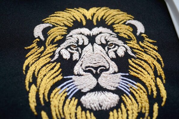 Elegant lion embroidery for animal themed projects