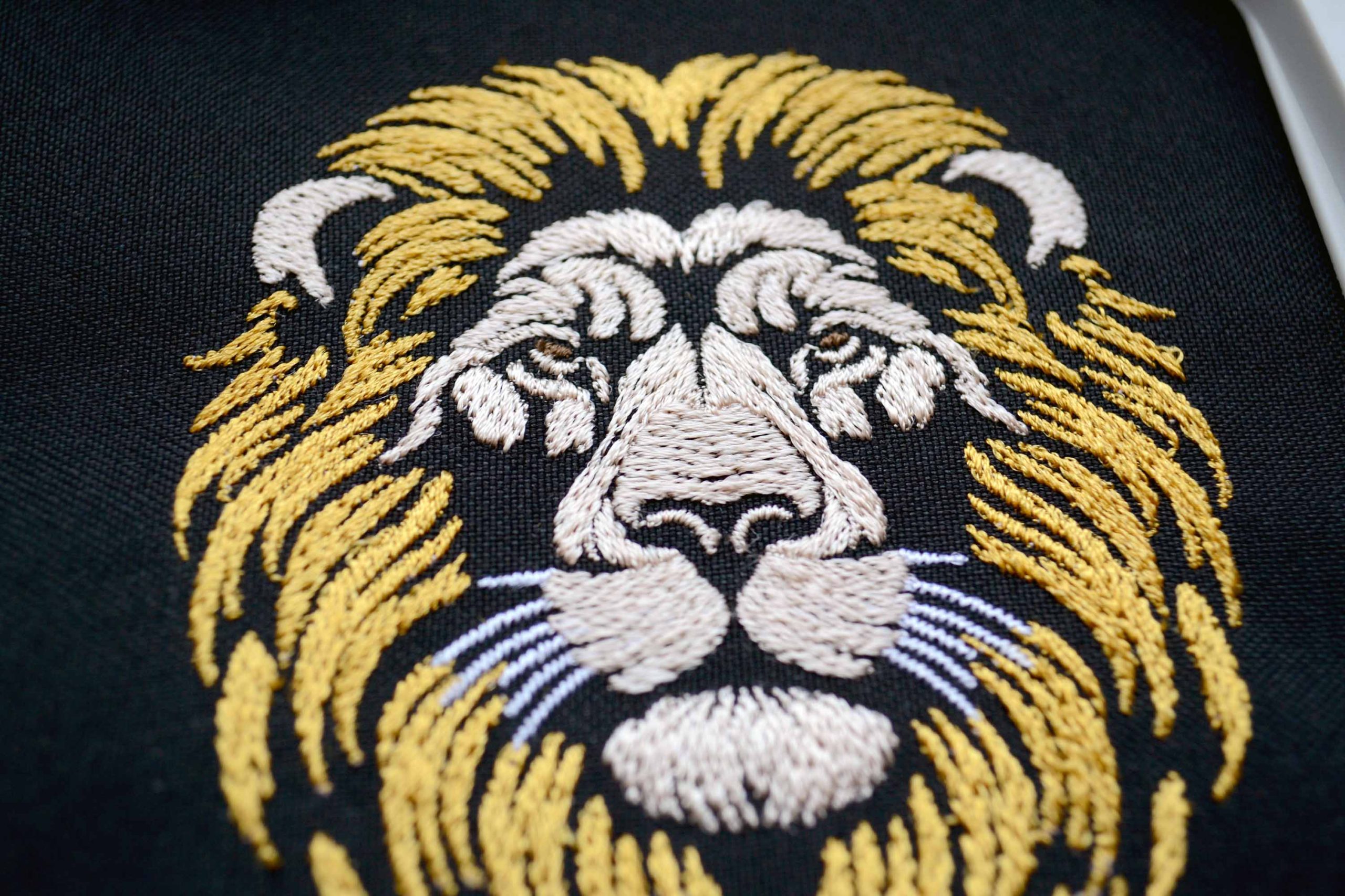 Elegant lion embroidery for animal themed projects Elegant lion embroidery for animal themed projects
