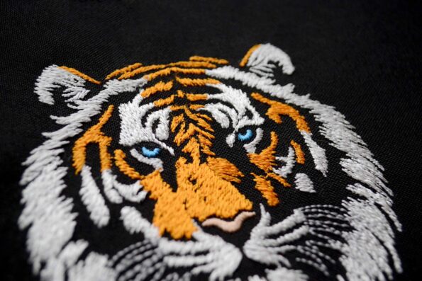 Fierce tiger face embroidery for statement pieces