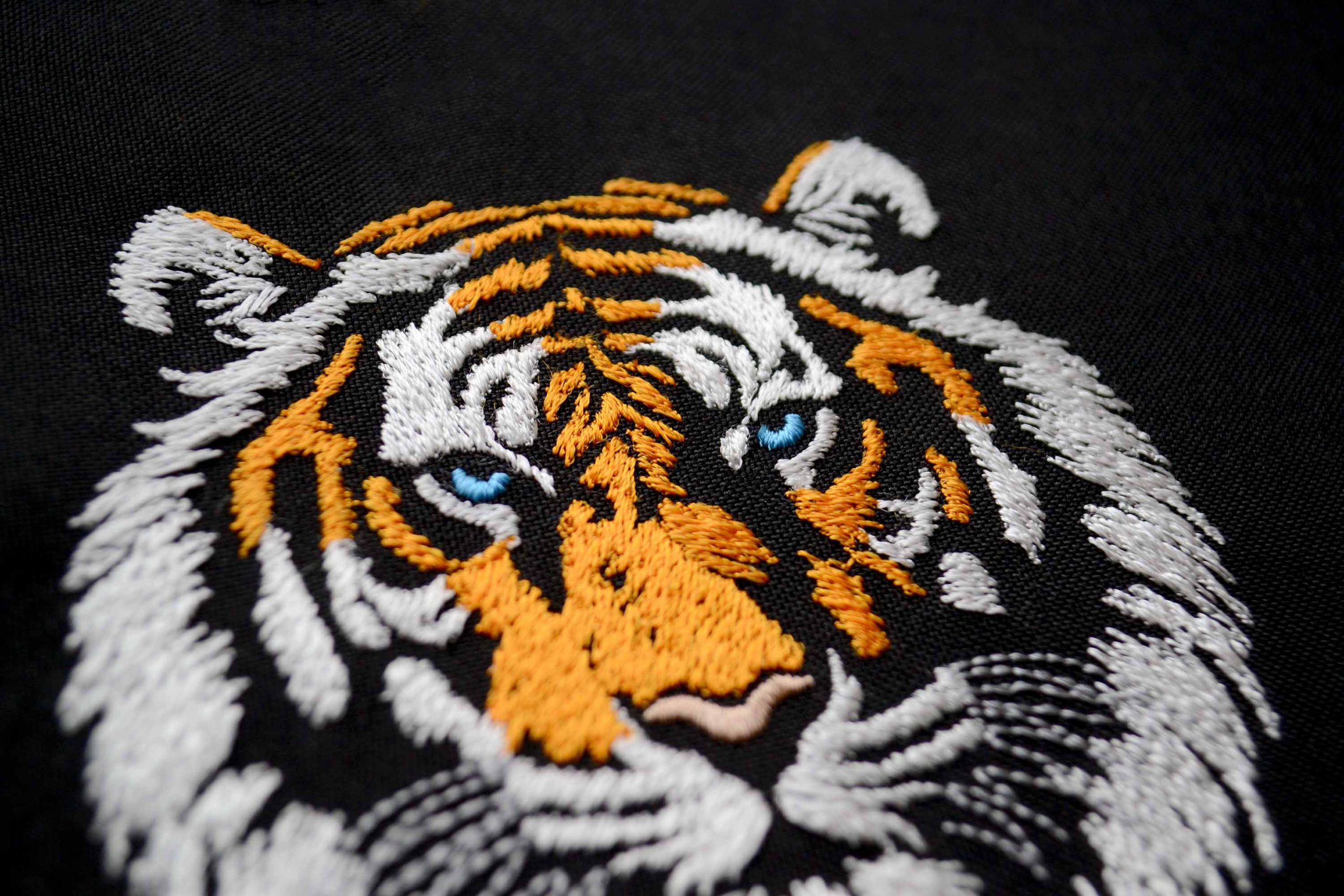 Fierce tiger face embroidery for statement pieces Fierce tiger face embroidery for statement pieces