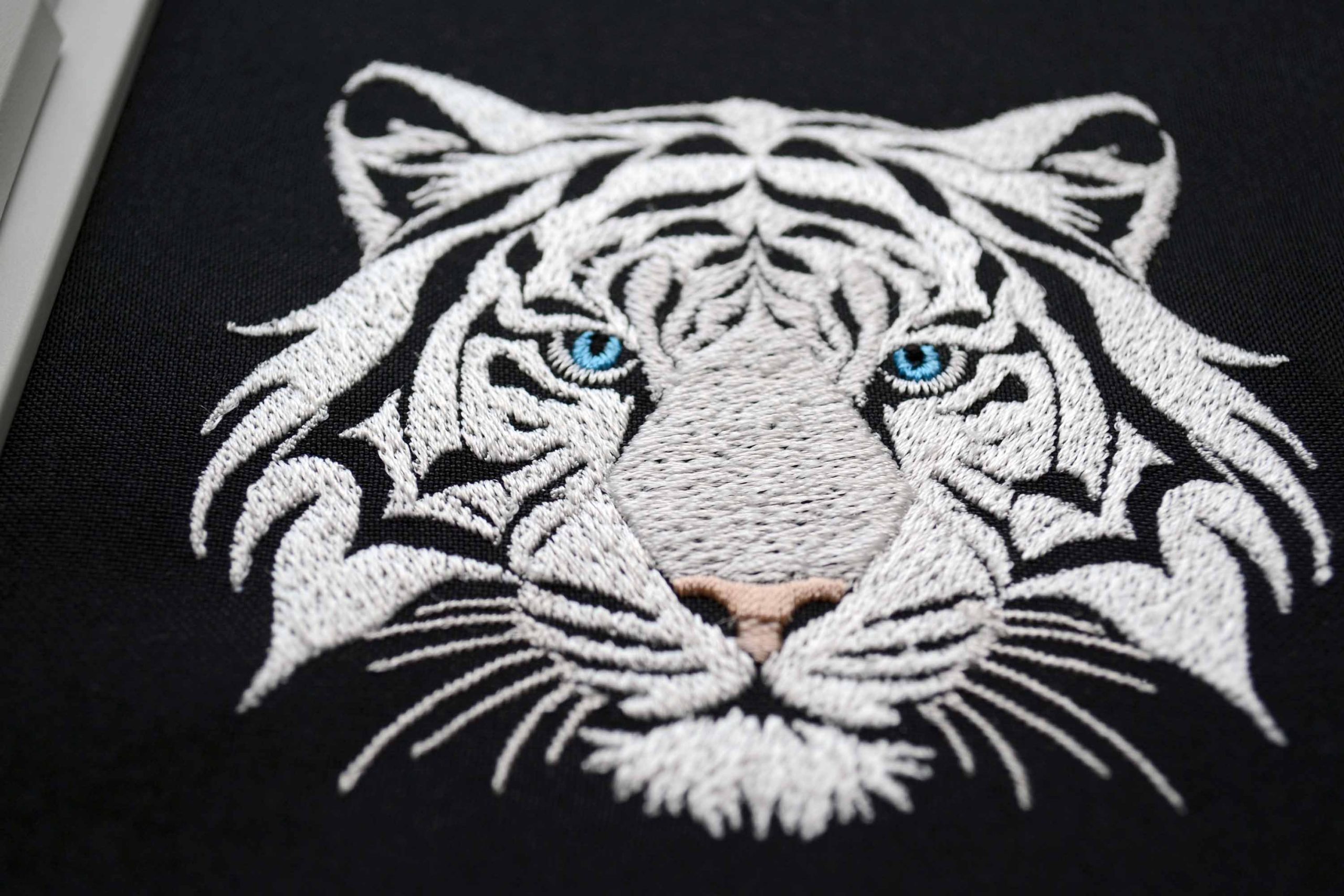 Elegant white tiger design for dark textiles Elegant white tiger design for dark textiles