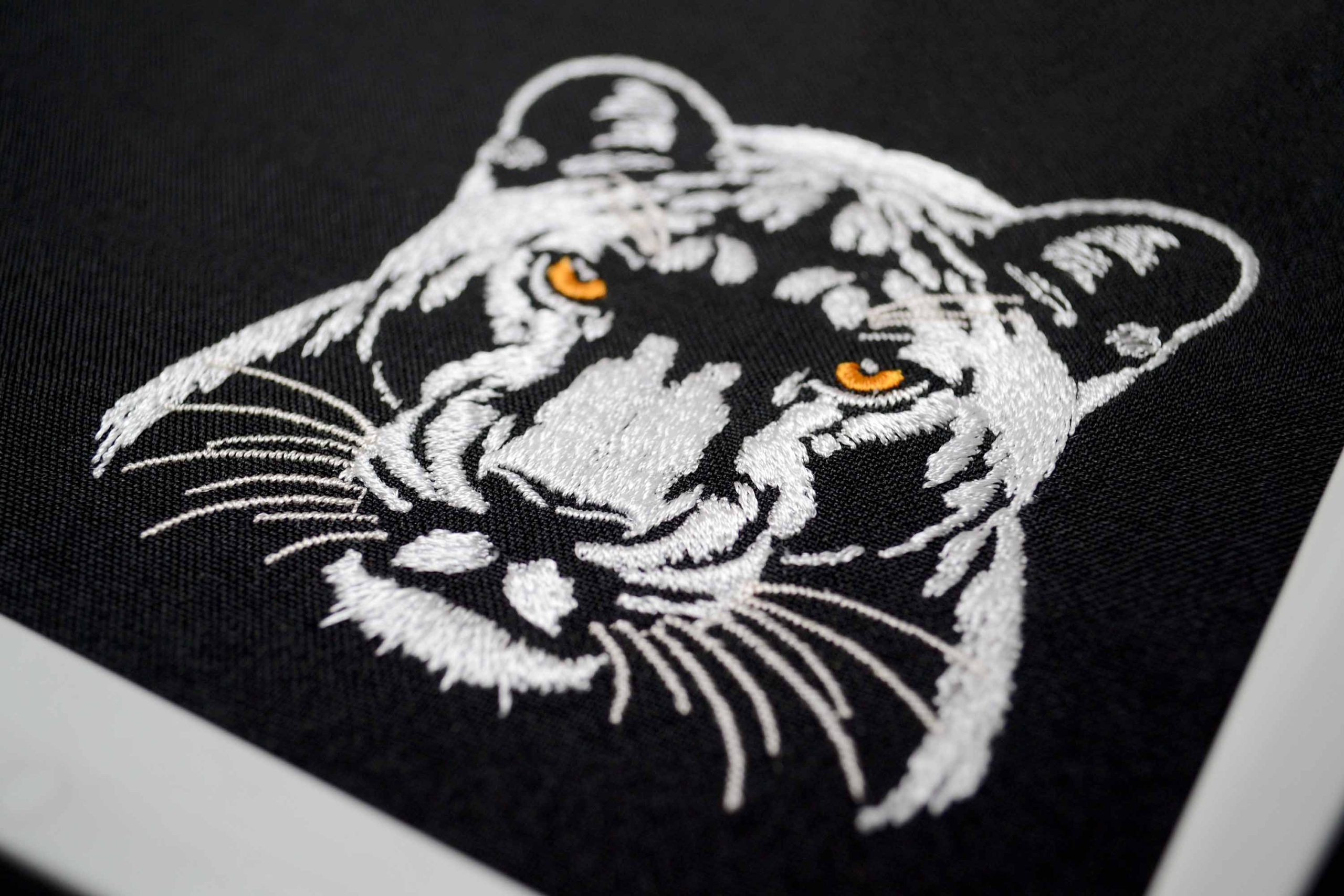 Exquisite white panther embroidery for apparel Exquisite white panther embroidery for apparel