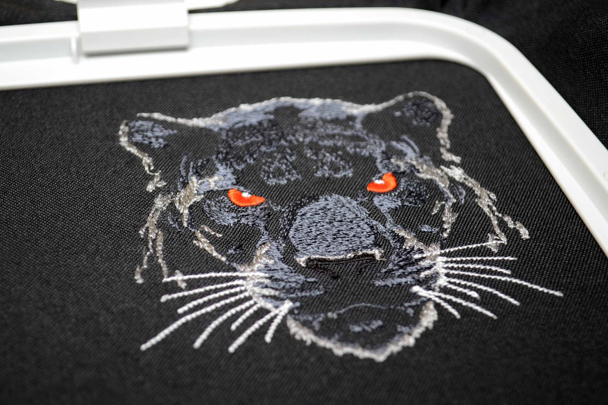 Realistic panther head filled stitch embroidery Realistic panther head filled stitch embroidery