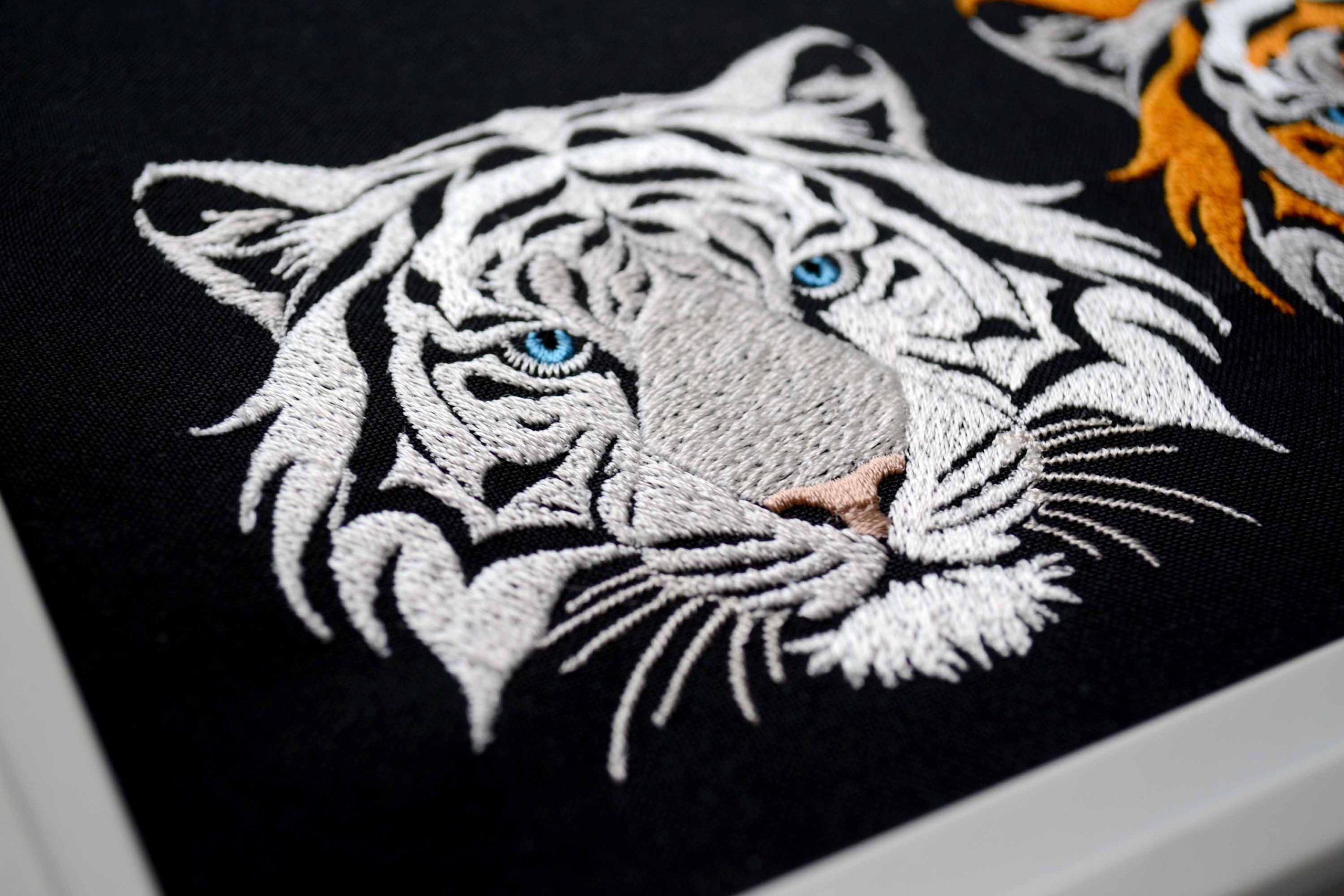 Wild animal monochrome embroidery for apparel Wild animal monochrome embroidery for apparel